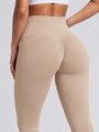 Beżowe legginsy push up z wysokim stanem